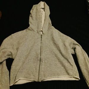 Grey cropped jacket.